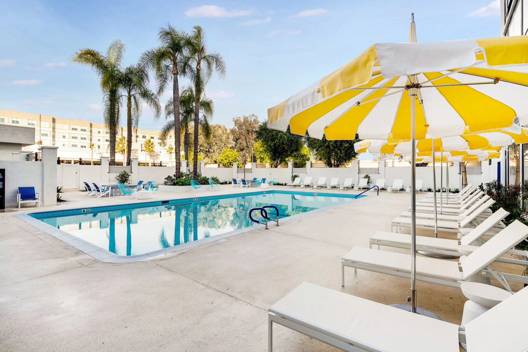 Hotel Lulu outdoor swimming pool and lounge seating